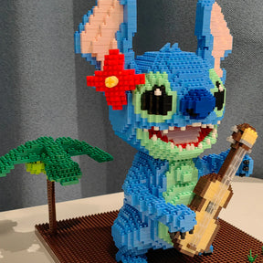 Blaues Wesen mit Gitarre