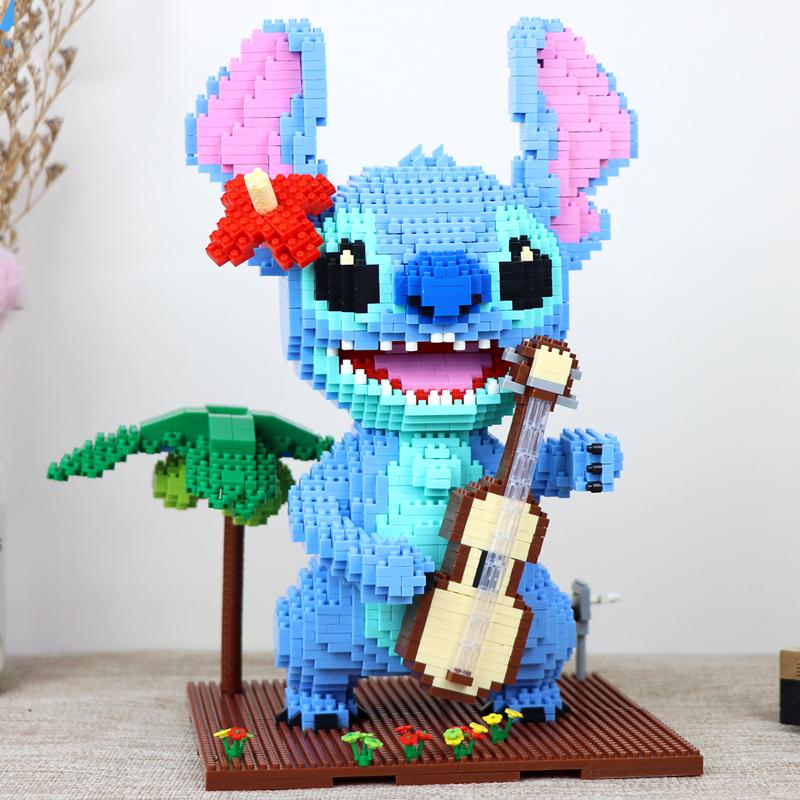 Blaues Wesen mit Gitarre