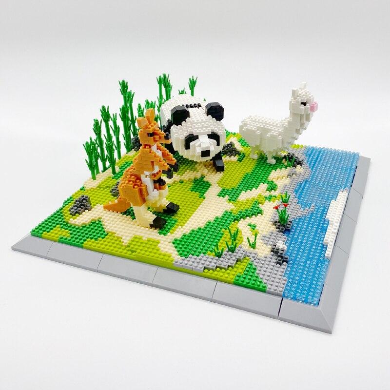 Panda, Känguru und Alpaka auf dem Gras